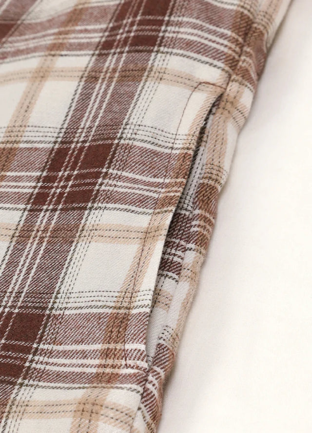Detailed view of women's chocolate cream long sleeves flannel shacket side pocket