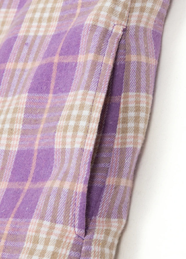 Detailed view of women's purple long sleeves flannel shacket side pocket