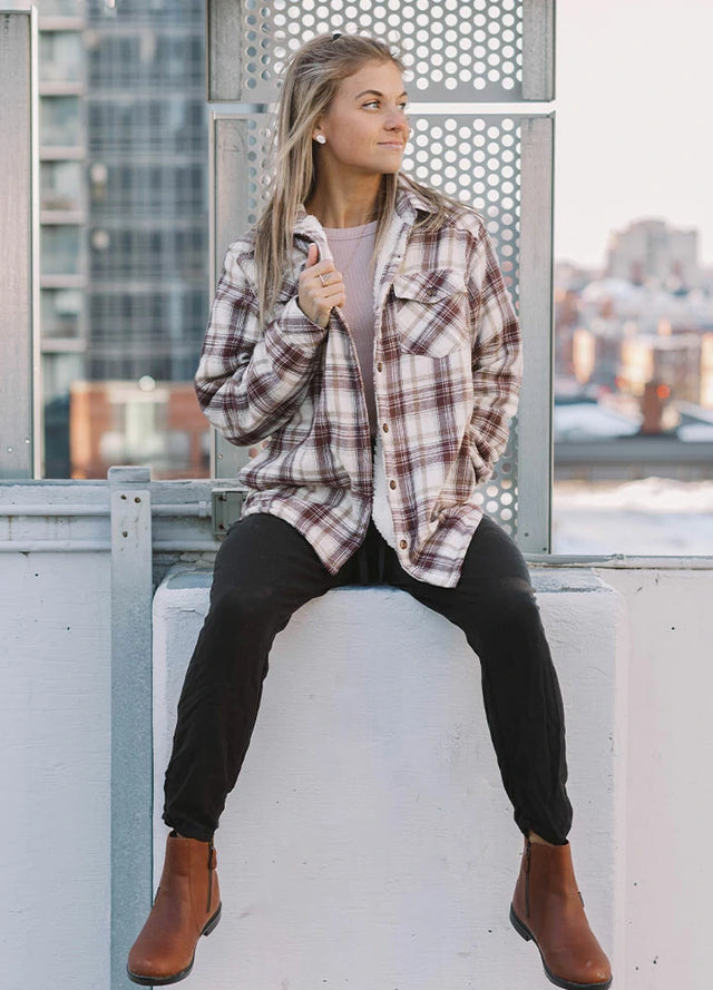 Women wearing a sherpa-lined warm chocolate cream flannel shirt jacket