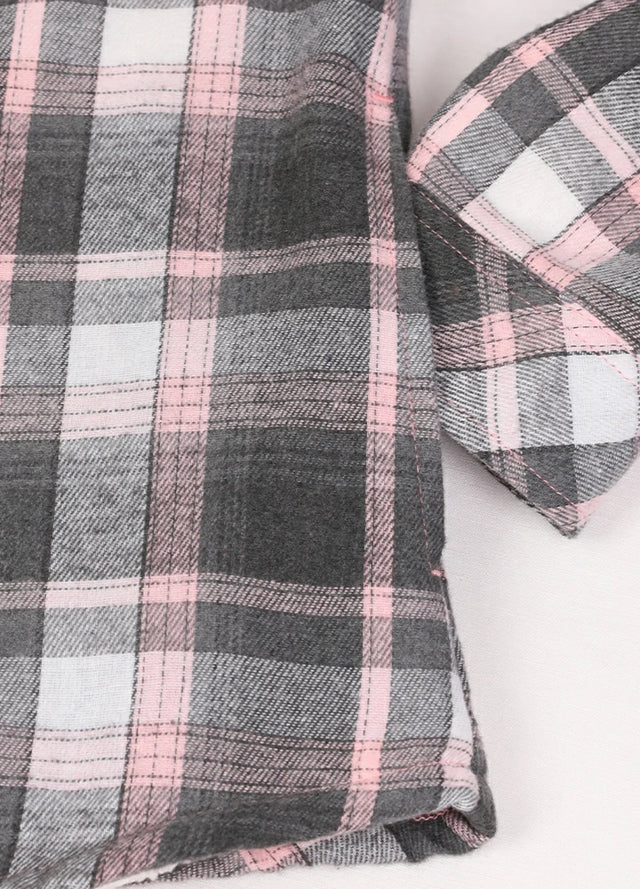 Detailed view of women's pink gray sherpa-lined flannel shacket hand pocket