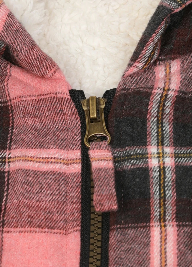 Zoomed-in view of full zip on girls pink black flannel jacket