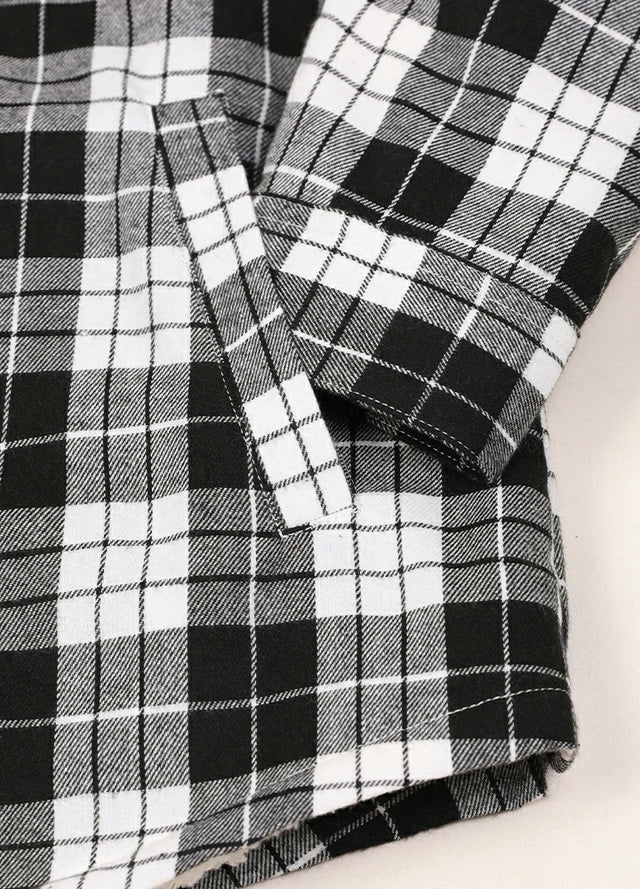 Zoomed-in of women's zip-up black white plaid hooded jacket hand pocket