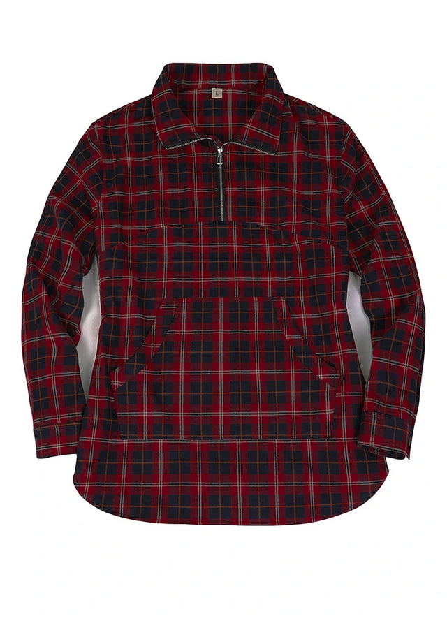 Front view of a women's red and navy quarter zip flannel shirt