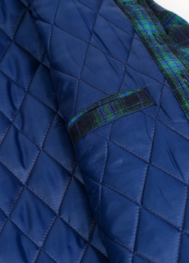Close-up of the inner pocket of the Navy and Green cozy quilted lined plaid hooded jacket for men