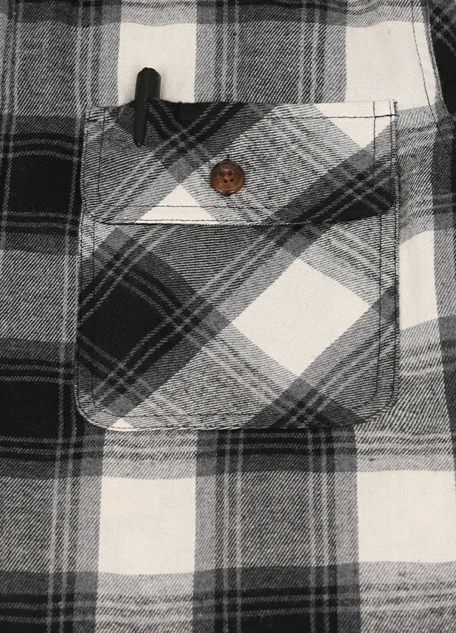 Close-up of the pocket of the black white men's outdoor button up hooded jacket