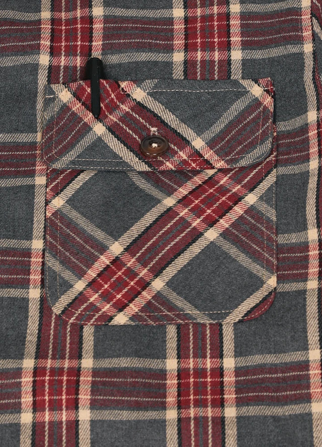 Detailed view of the pocket of the red gray men's button up plaid hooded jacket