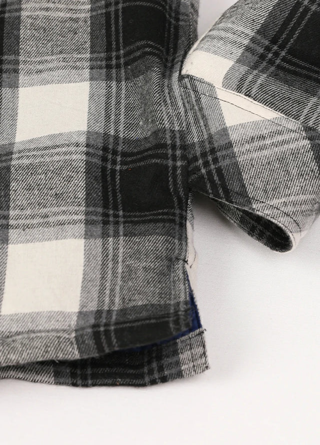 Close-up of the hand pocket of a red gray men's outdoor button up hooded jacket