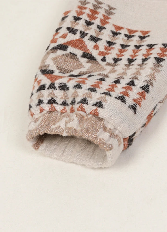 Zoomed-in view of the cuffs on a womens aztec cropped khaki brown shacket with full zip