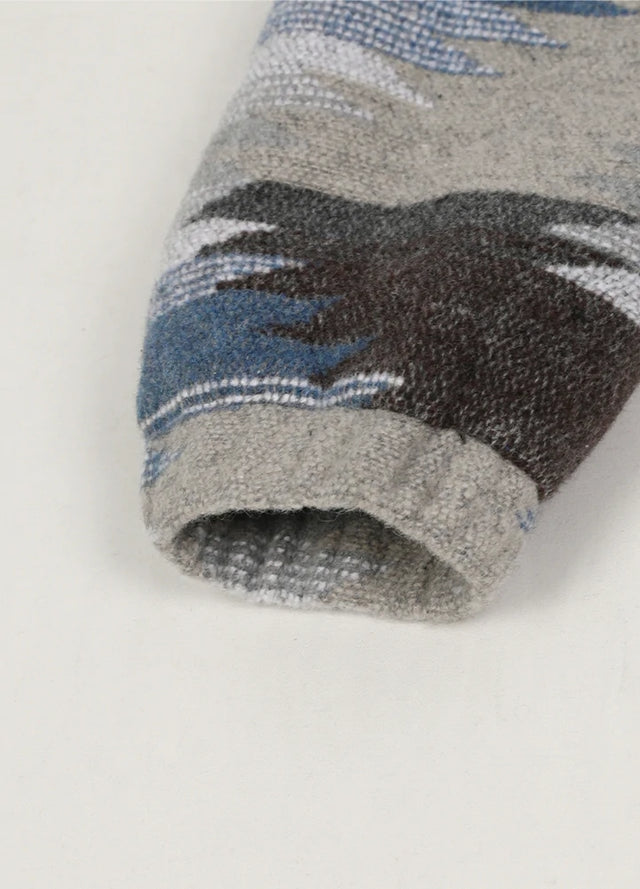 Zoomed-in view of the cuffs on a womens aztec cropped gray blue shacket with full zip