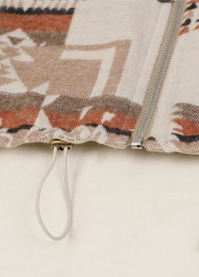 Detailed view of womens khaki brown full zip aztec cropped jacket hem