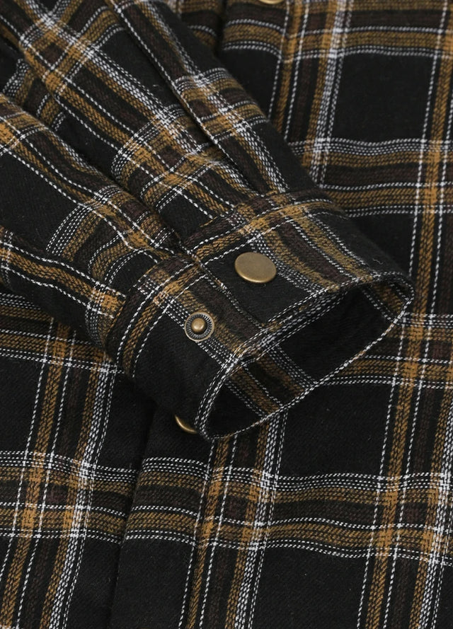 Close-up of the cuff of the black latte fleece lined flannel jacket for men