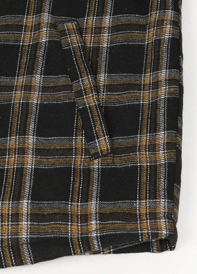 Close-up of the hand pocket of the black latte fleece lined flannel jacket for men