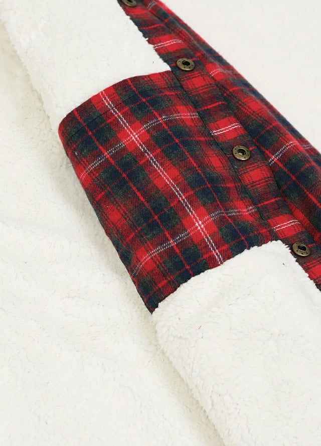 Close-up of the inner pocket of the red men's warm sherpa lined jacket with removable hood
