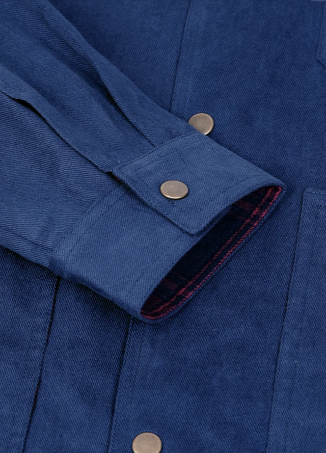 Close-up of the cuff of the blue men's durable flannel shirt jacket