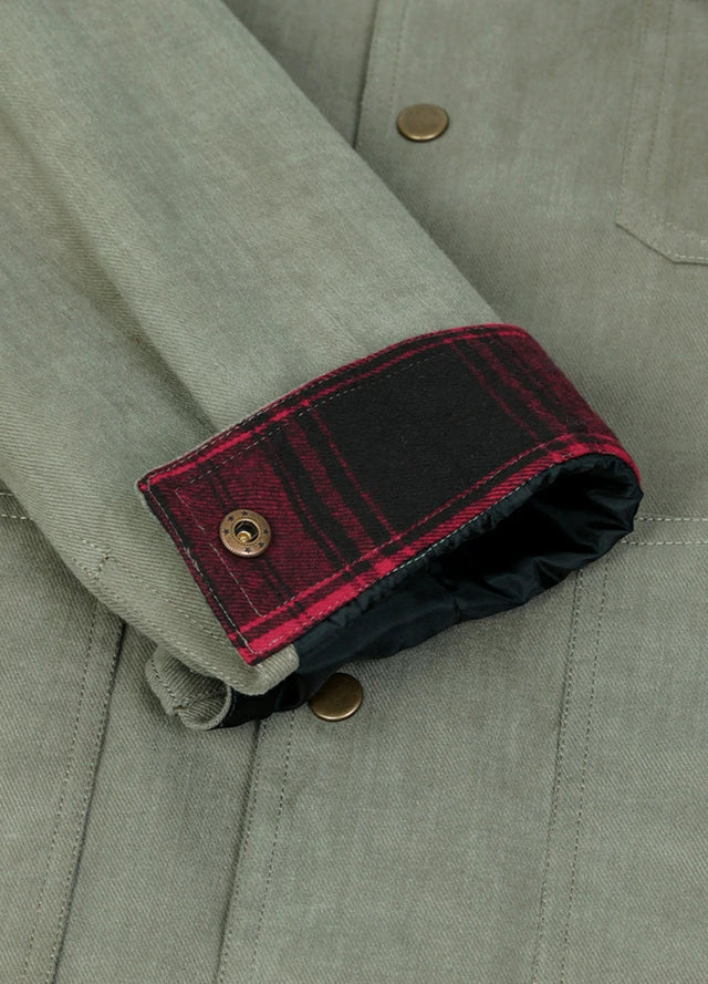 Close-up of the cuff of the light green men's casual flannel lined plaid jacket