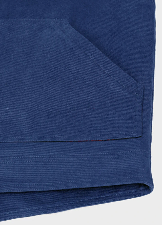 Close-up of the hand pocket of the blue men's durable flannel shirt jacket