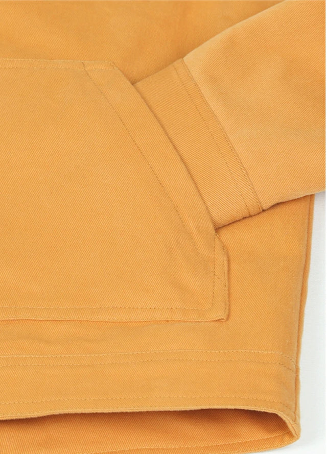 Close-up of the hand pocket of the yellow men's casual flannel lined jacket