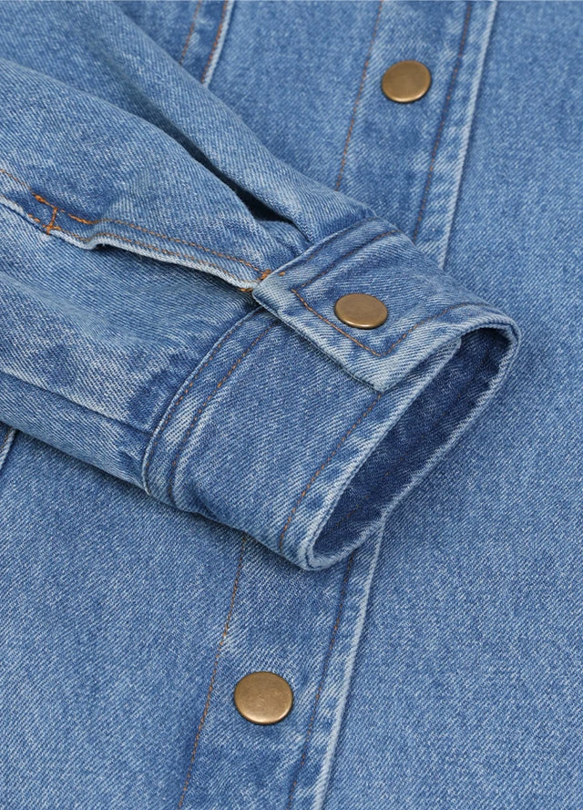 Close-up of the cuff of the men's blue warm flannel lined denim shacket