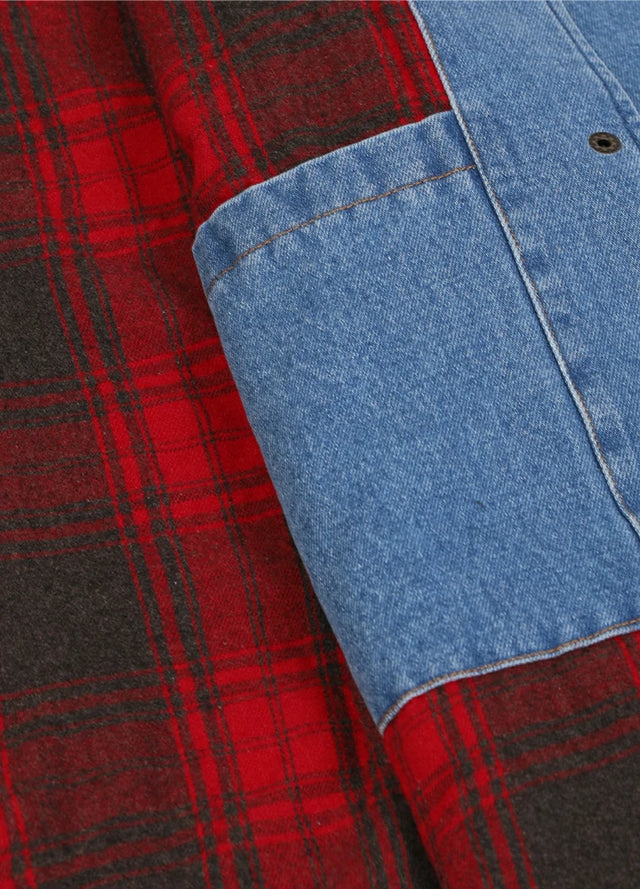 Detail view of the inner pocket of men's blue cozy flannel lined denim shacket