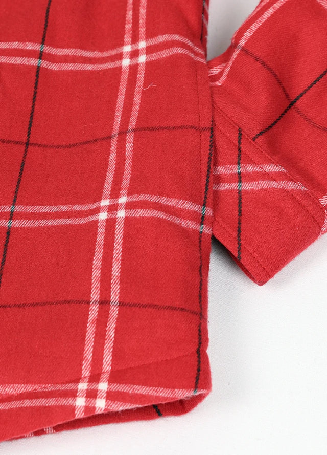 Zoomed-in of women's button down red plaid flannel jacket hand pocket