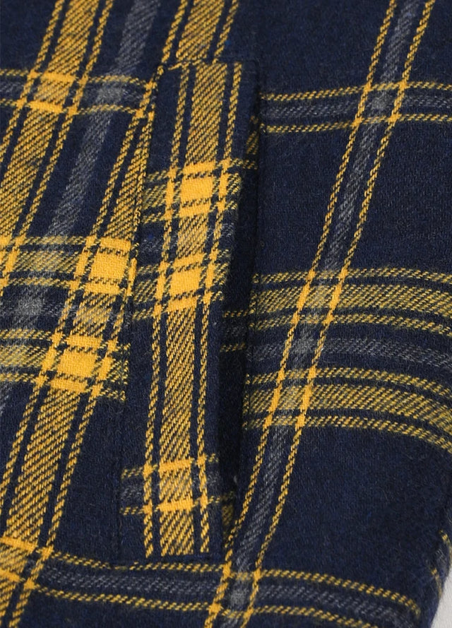 Detail of kids fleece-lined snap black yellow flannel jacket with warm hand pocket