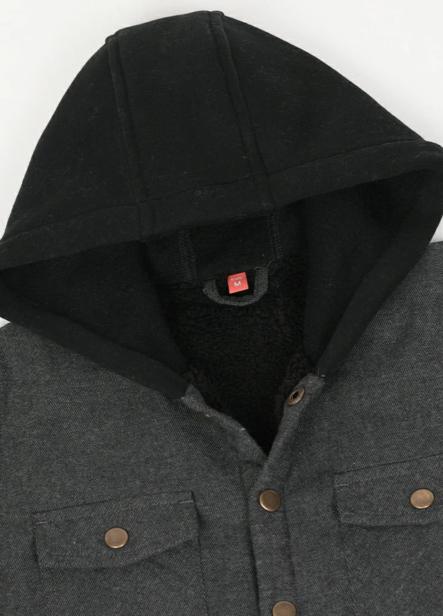 Close-up of hood detail on kid's black flannel jacket