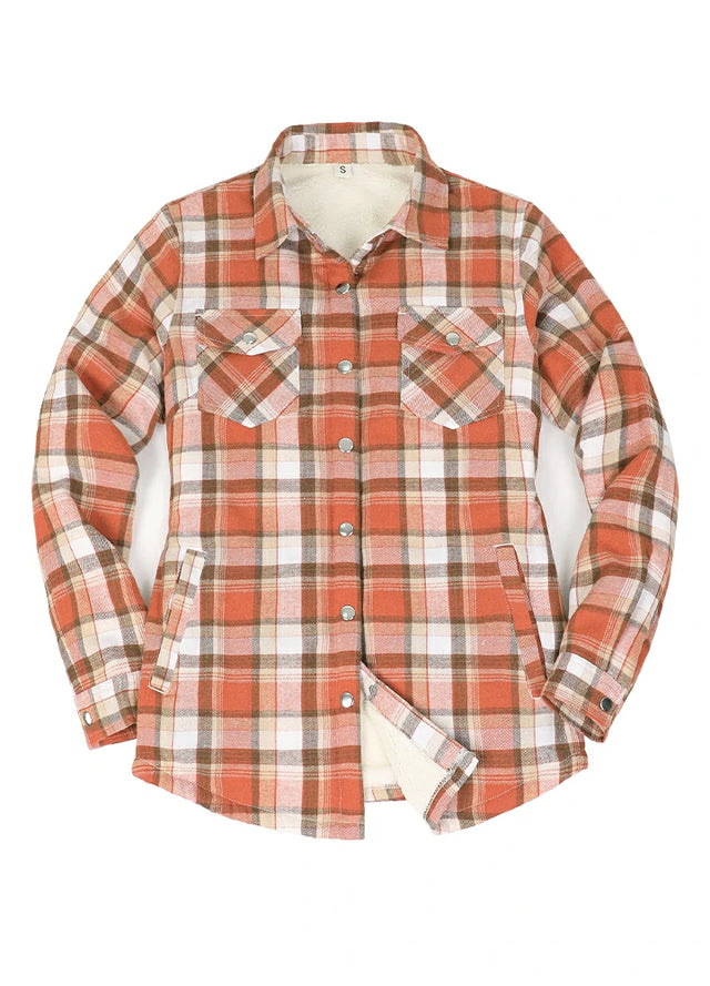 Front view of a women's snap sherpa lined rust red flannel jacket