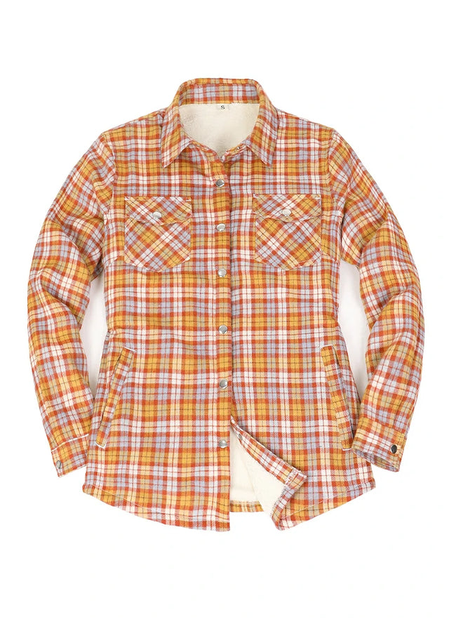 Front view of a women's snap sherpa lined orange plaid flannel jacket