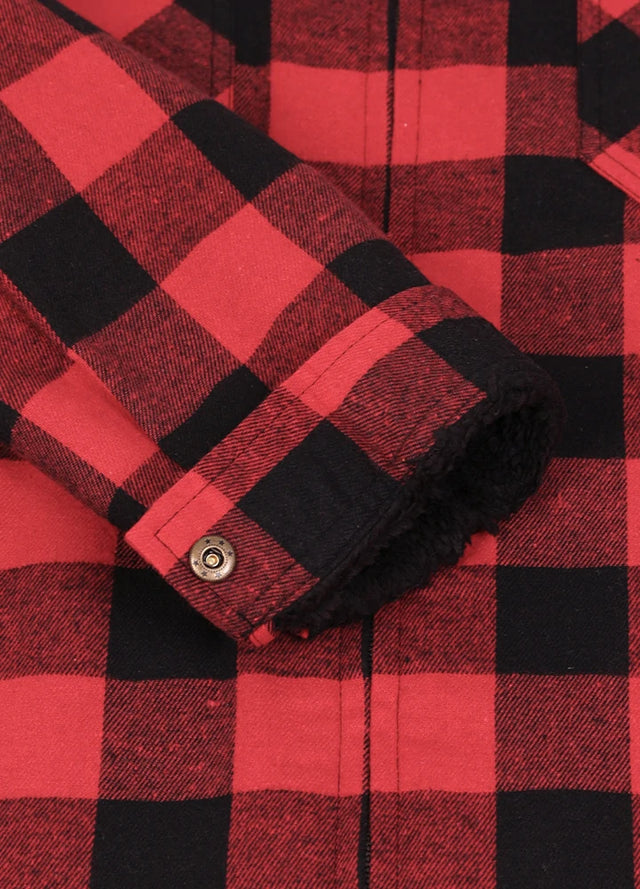 Close-up of the cuff of black red men's warm sherpa lined plaid shacket