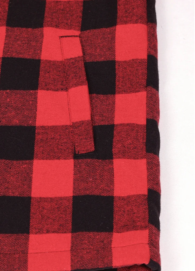 Close-up of the handpocket of the black red men's warm sherpa lined plaid shacket