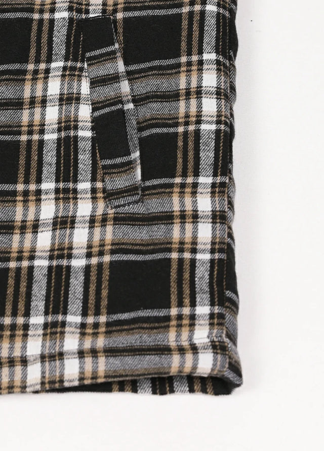 Close-up of the handpocket of the coffee black men's sherpa lined flannel shacket