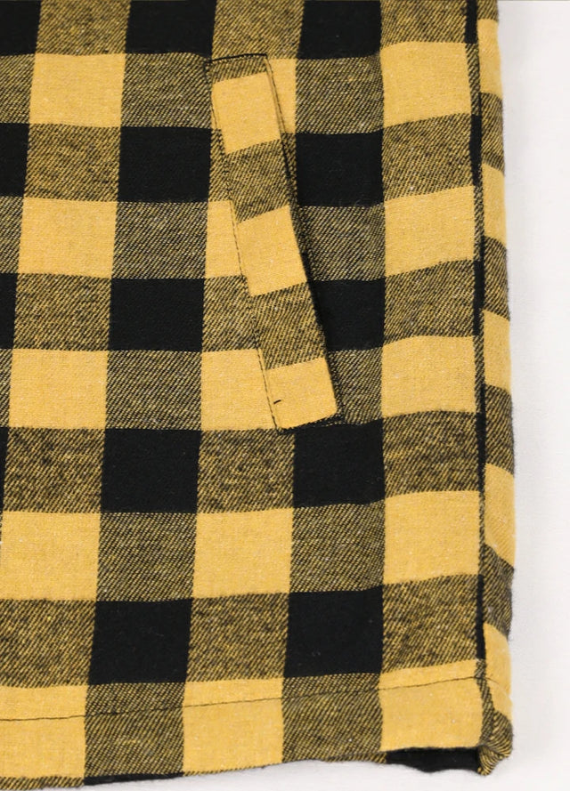 Close-up of the handpocket of the yellow and black fleece lined plaid jacket for men