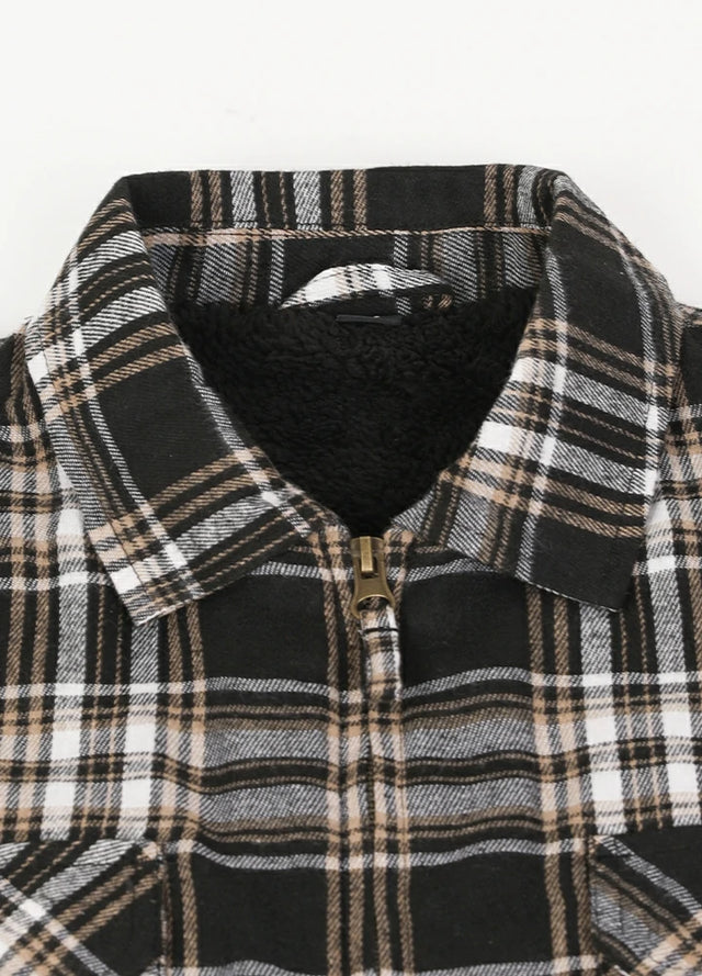 Close-up of the lapel of the coffee black men's fleece lined flannel shacket