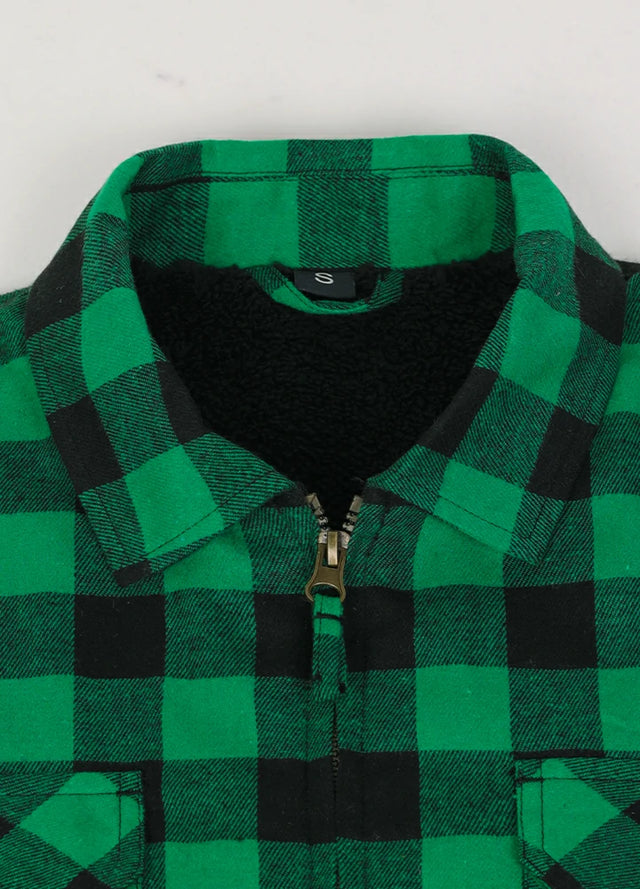 Close-up of the lapel of the green black men's cozy sherpa lined plaid flannel shacket