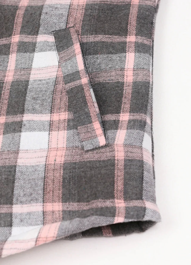 Close-up of womens sherpa-lined pink gray flannel hooded hand pocket