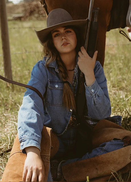 Women wearing a light blue flannel-lined denim shirt jacket