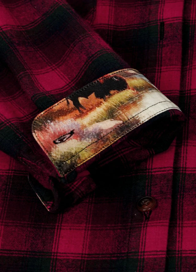 Close-up of women's lightweight red black flannel shirt cuffs