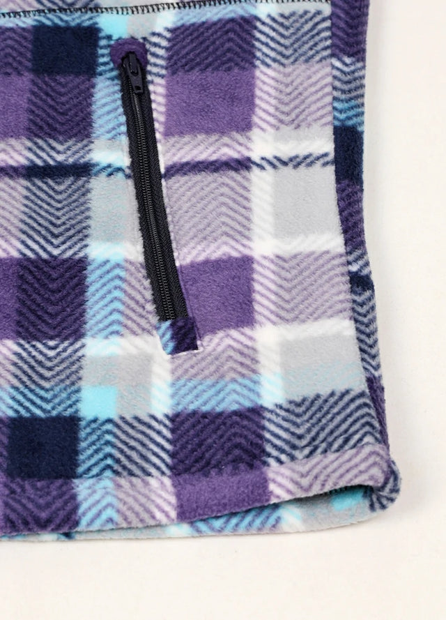Close-up of women's purple plaid sherpa-lined fleece jacket hand pocket