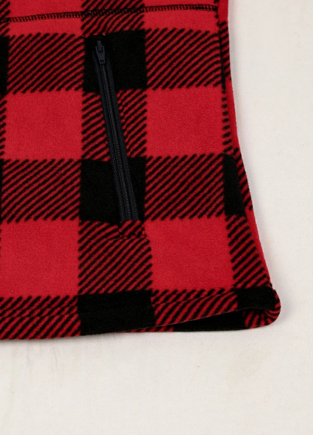 Close-up of women's red black sherpa-lined fleece jacket hand pocket