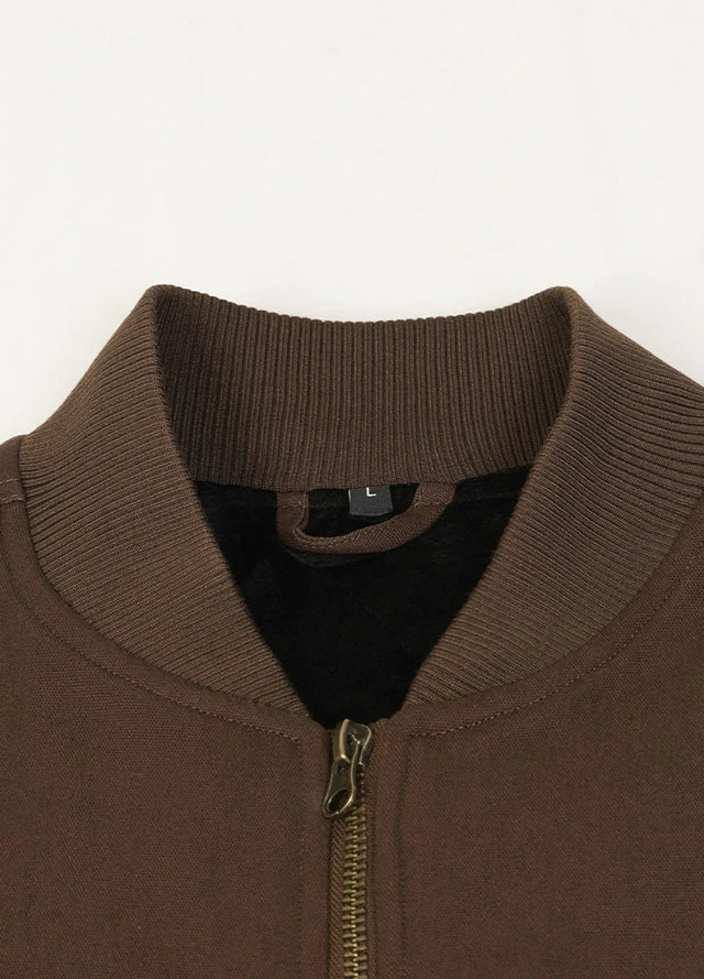Close-up of the collar detail on men's Dark Brown arctic quilted lined canvas work vest
