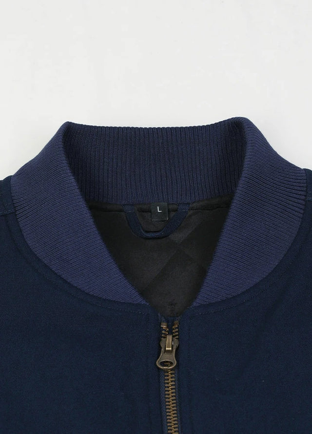 Close-up of the collar detail on men's arctic quilted lined canvas work vest