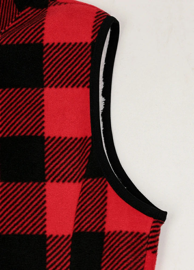 Close-up of women's warm sherpa-lined red black plaid fleece vest cuffs