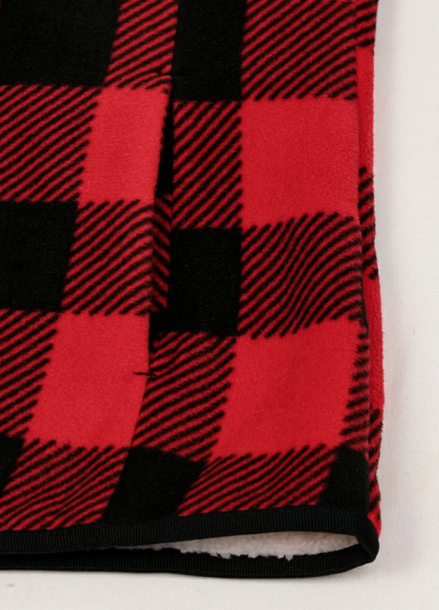 Detailed view of women's winter red black sweater fleece vest hand pocket