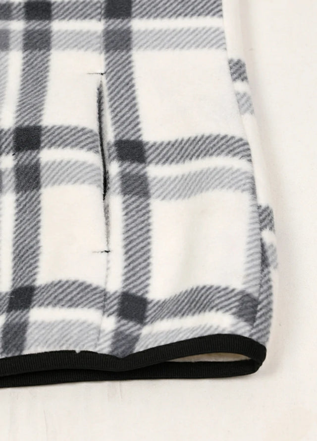 Detailed view of women's winter white sweater fleece vest hand pocket