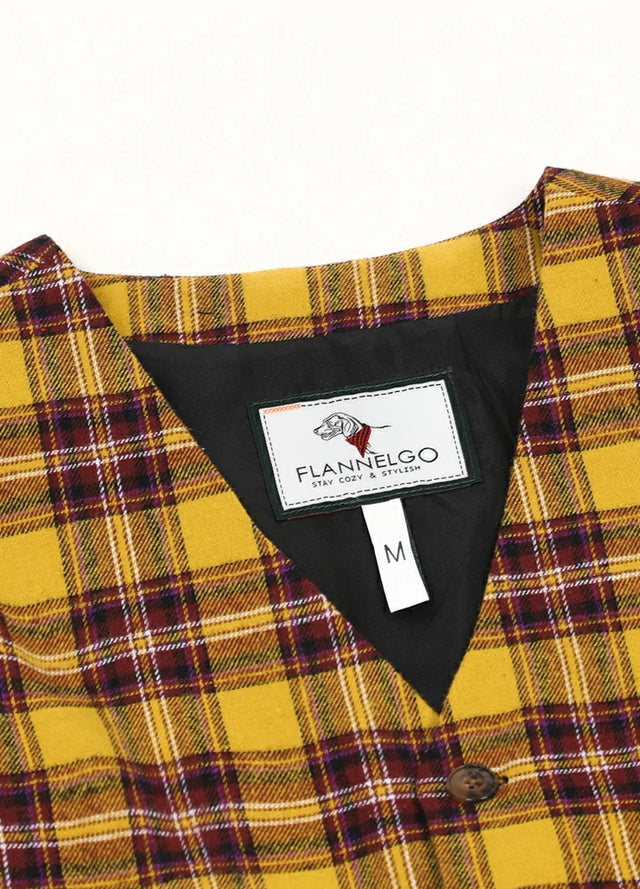 Detailed close-up of kids golden yellow plum suit vest with four-button closure