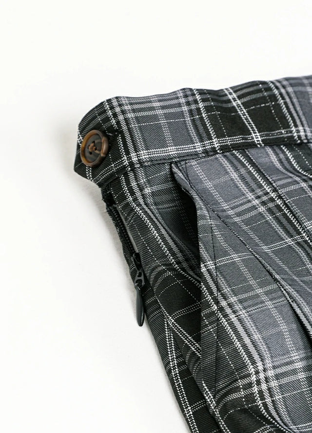 Close-up of women's black gray high-waisted mini skirt side pocket