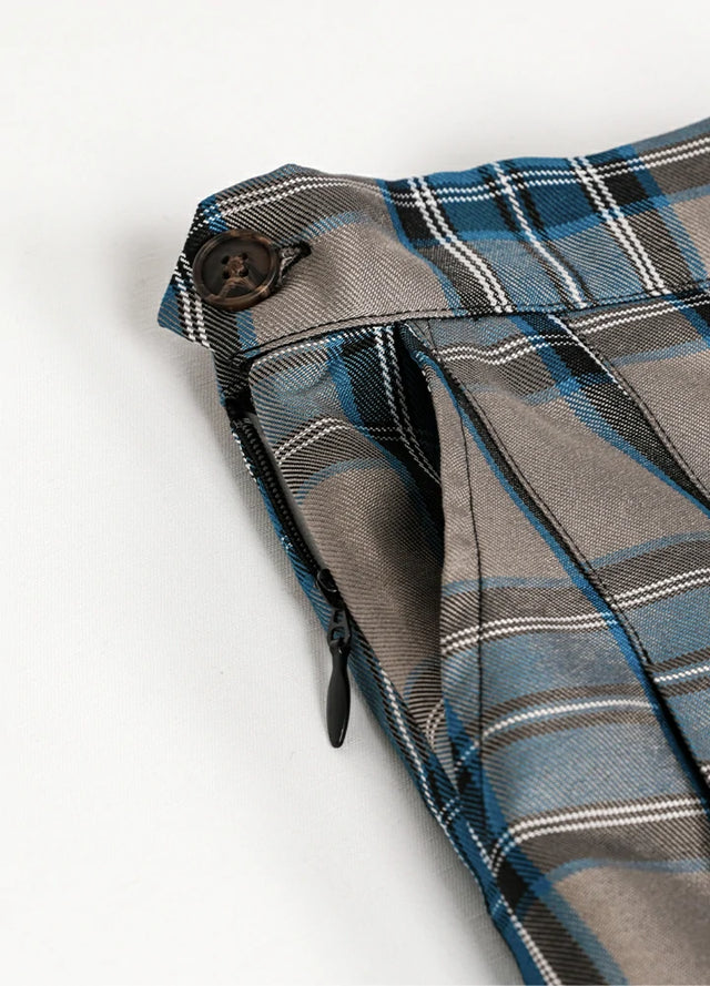 Close-up of women's gray blue plaid high-waisted mini skirt side pocket