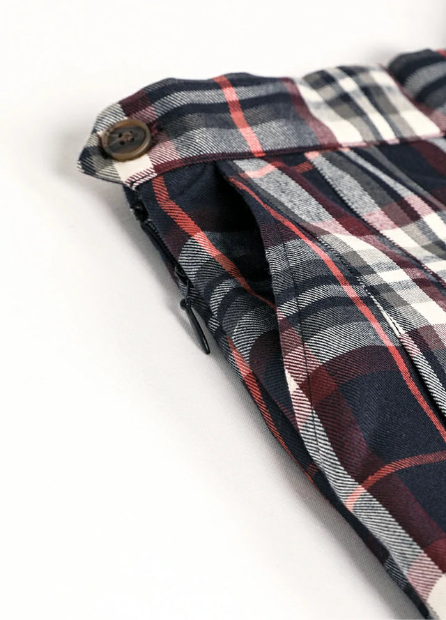 Close-up of women's navy burgundy high-waisted mini skirt side pocket