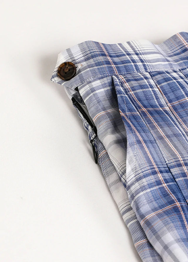 Close-up of women's blue white high-waisted mini skirt side pocket