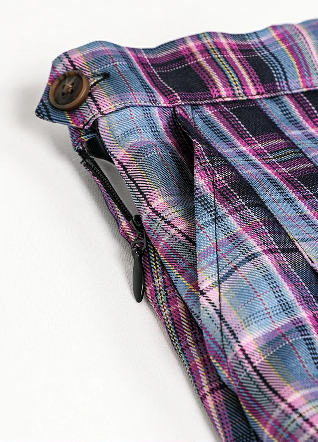 Close-up of women's purple blue high-waisted mini skirt side pocket